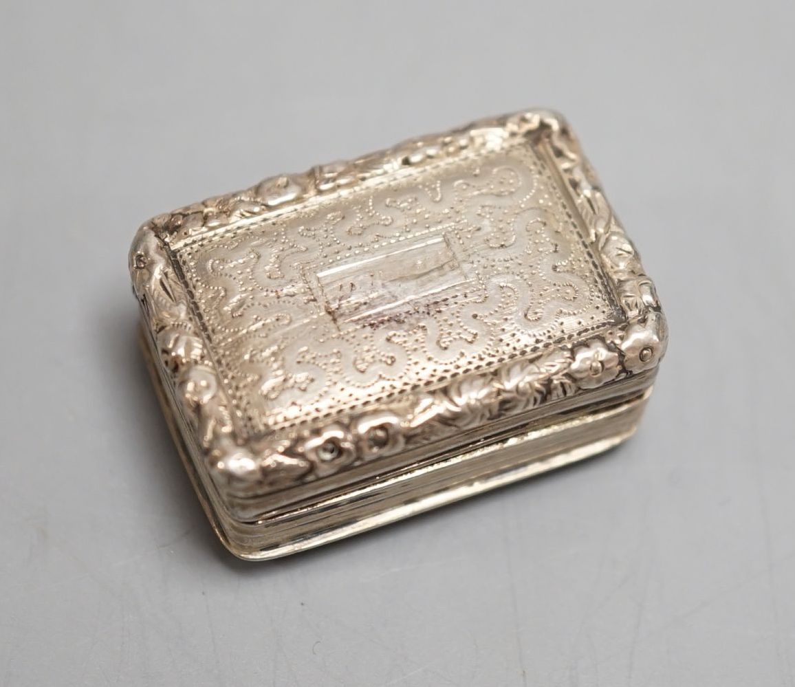 A George IV engraved silver rectangular vinaigrette, Thomas & William Simpson, Birmingham, 1824, 29mm.